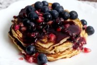 Fluffy American Pancakes with Pomegranate and Blueberries
