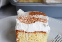 Coquito Layer Cake with Coconut Rum Frosting