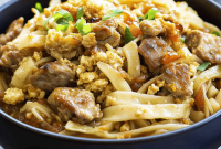Crispy Potsticker Noodle Bowls with Ginger Sesame Sauce