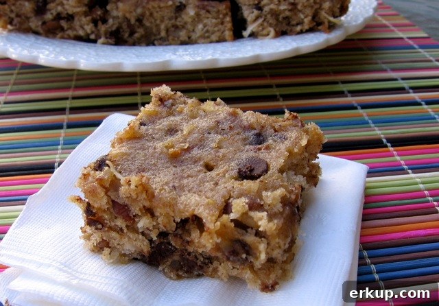 Banana Coconut Chocolate Chip Bars Recipe 2 Banana Coconut Chocolate Chip Cookie Bar on napkin.