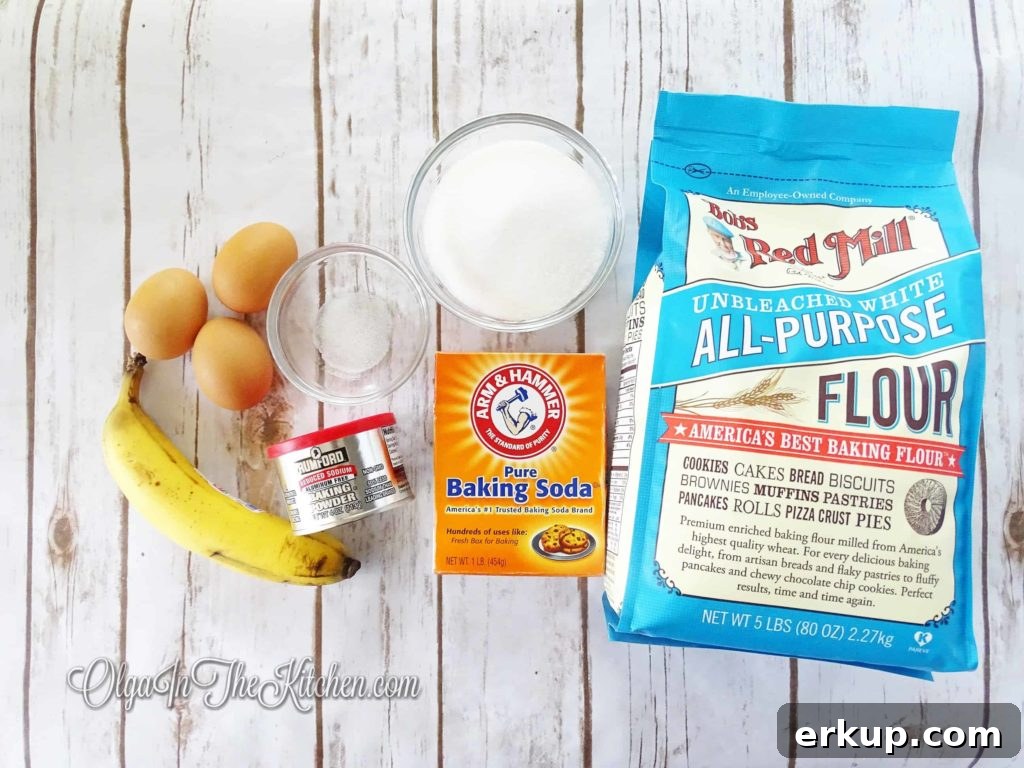 Banana Cake Roll Recipe with Cream Cheese Filling 4 Ingredients laid out for banana cake roll.