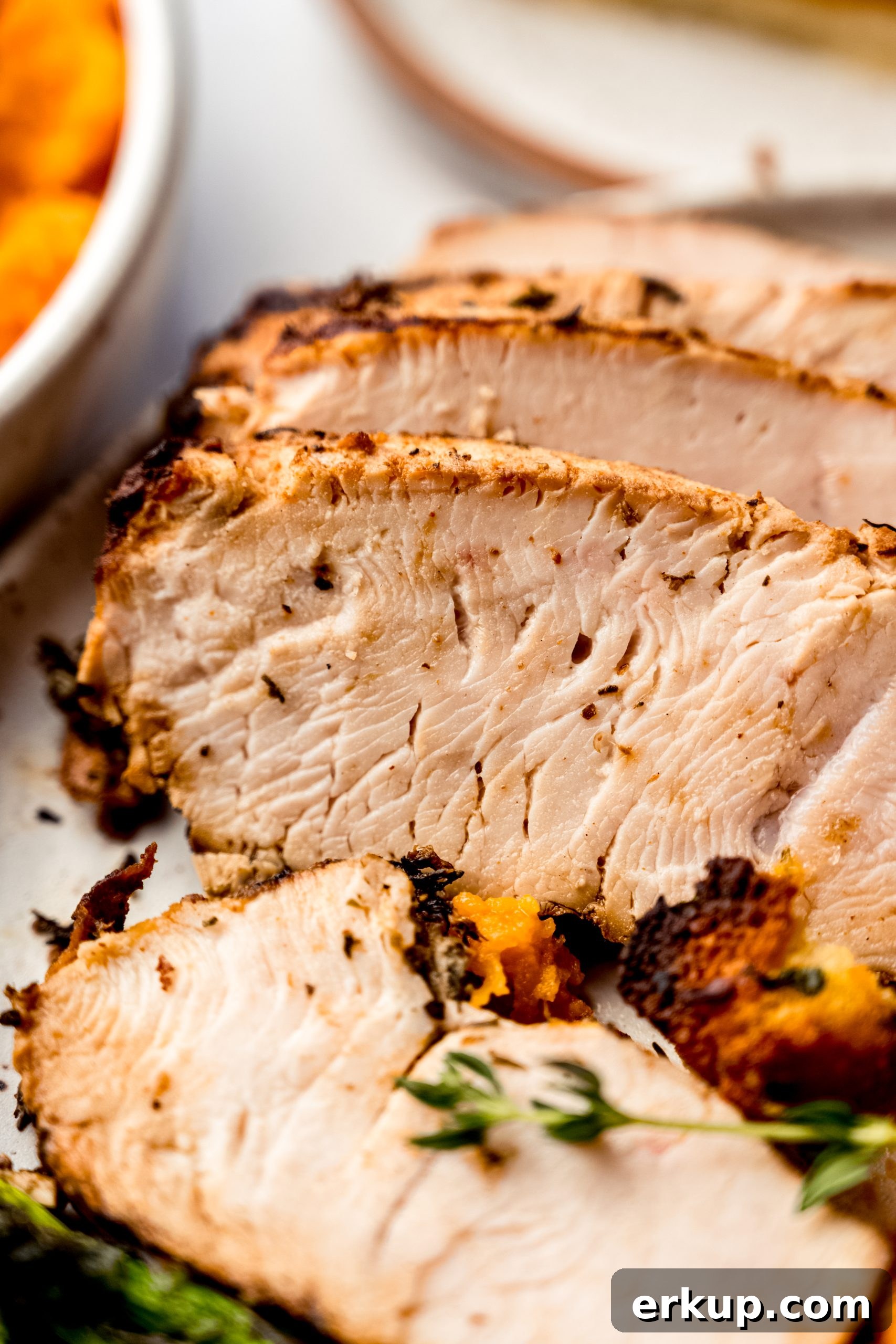 Juicy Oven-Roasted Turkey Tenderloin Recipe 3 A plate of turkey tenderloin.