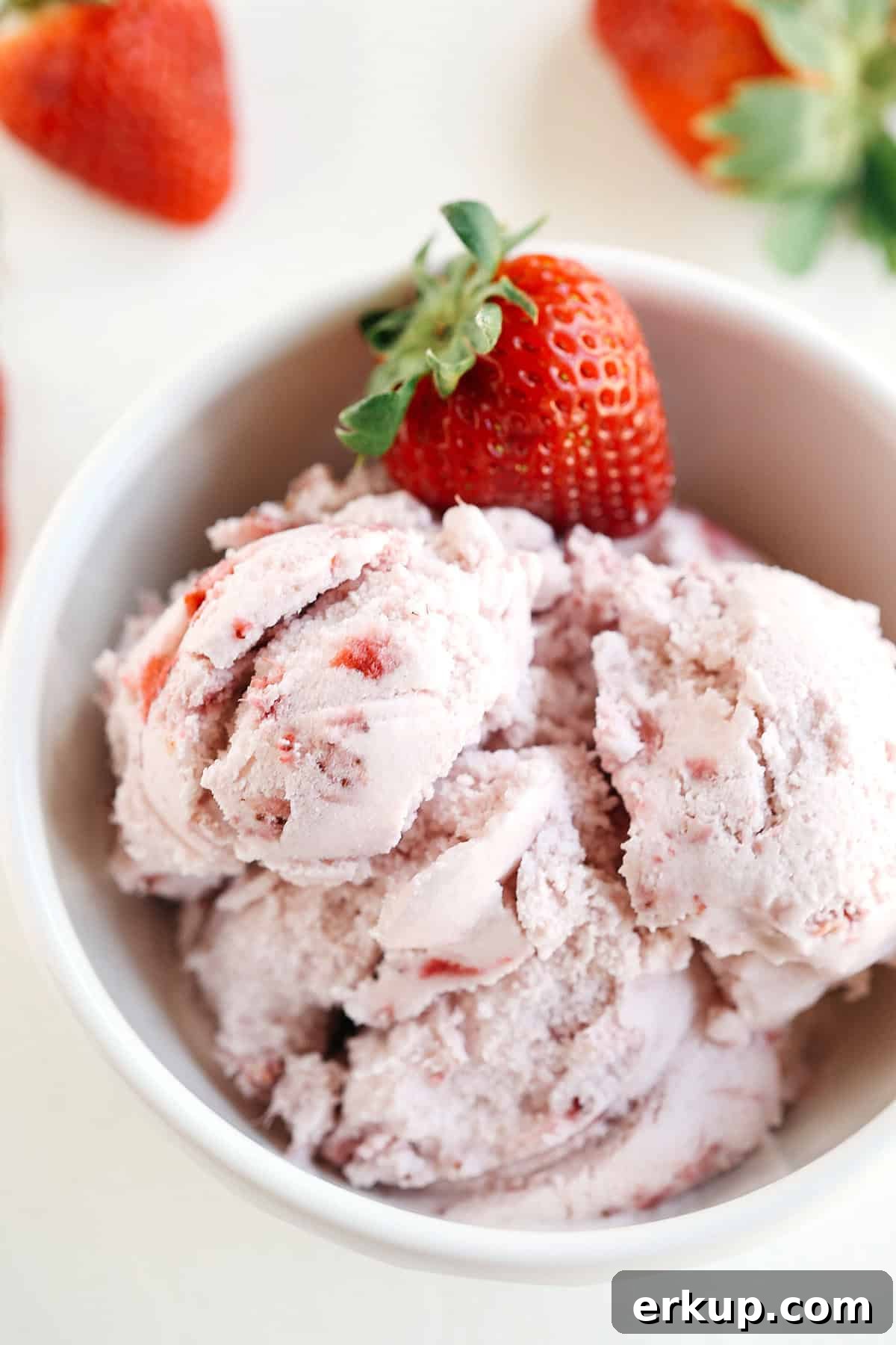 Perfectly sweet and creamy Balsamic Roasted Strawberry Ice Cream that is gluten-free and dairy-free with big chunks of strawberry in every bite!