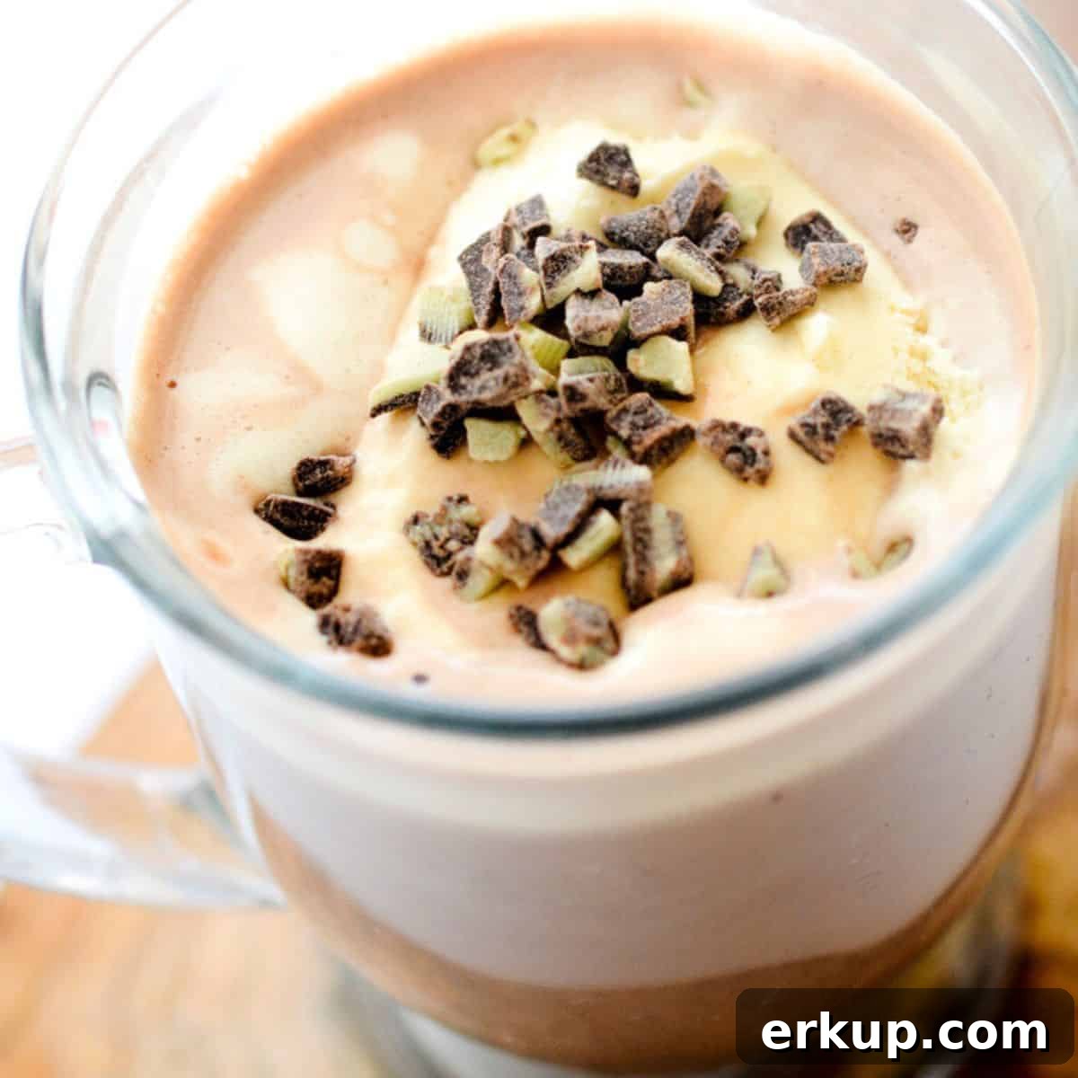 Creamy RumChata Hot Chocolate Recipe 3 Rumchata Hot Chocolate in a clear glass.