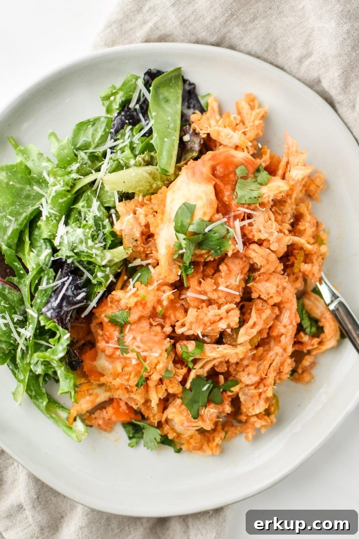Buffalo Chicken Quinoa Bake served with salad