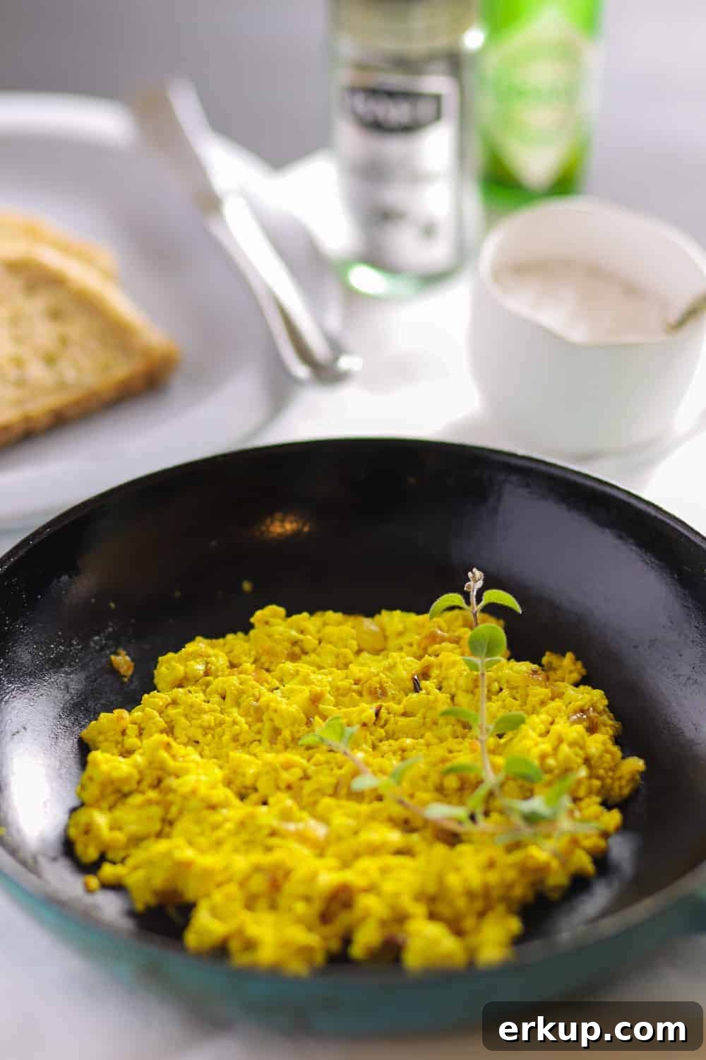 Vegan Tofu Scramble Recipe That Tastes Like Eggs 4 Pinterest graphic showing Tofu Scramble (vegan and gluten-free)