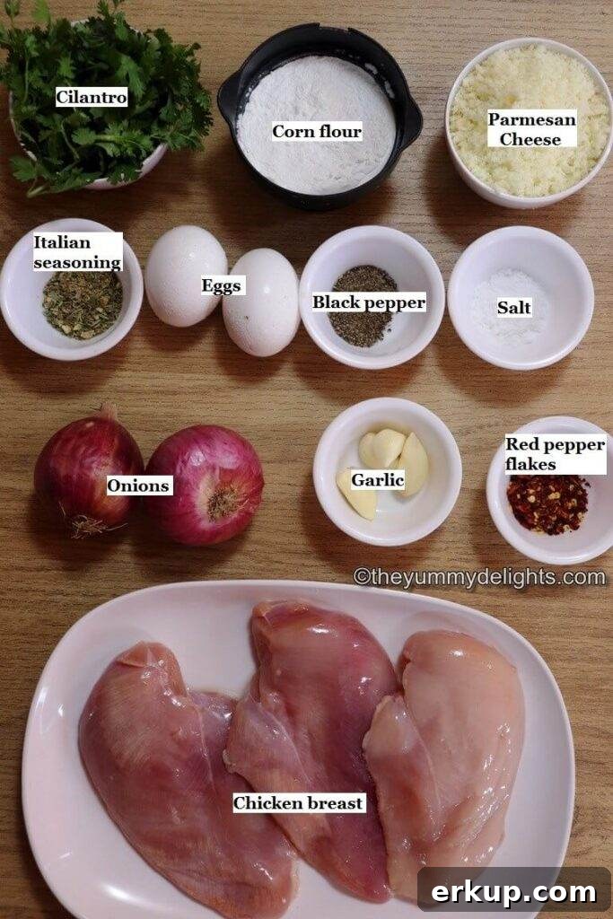 individually labelled ingredients to make cheesy chicken fritters recipe are laid out on a table.