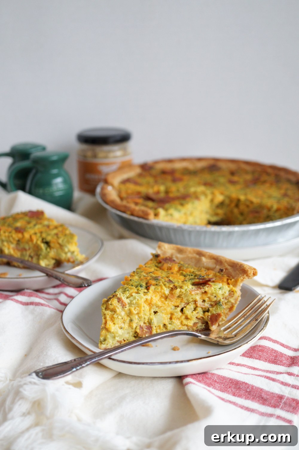 slice of quiche on plate