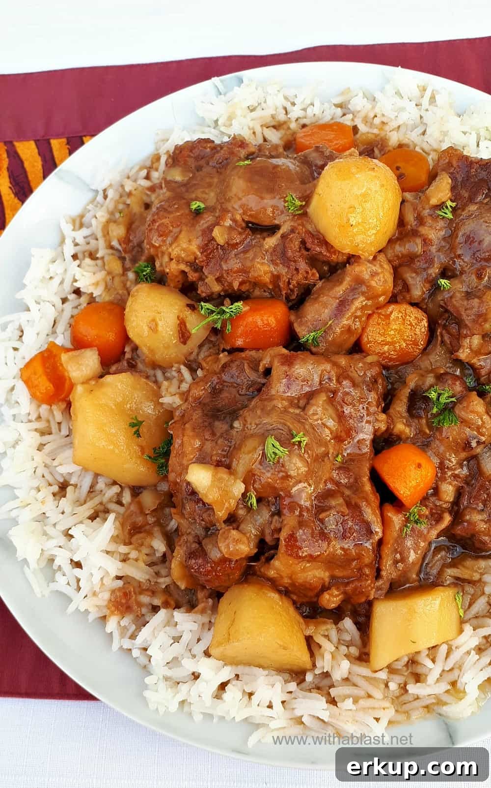 This Oxtail cooked in the Slow-Cooker turns out so tender and fall-off-bone - with a delicious rich sauce