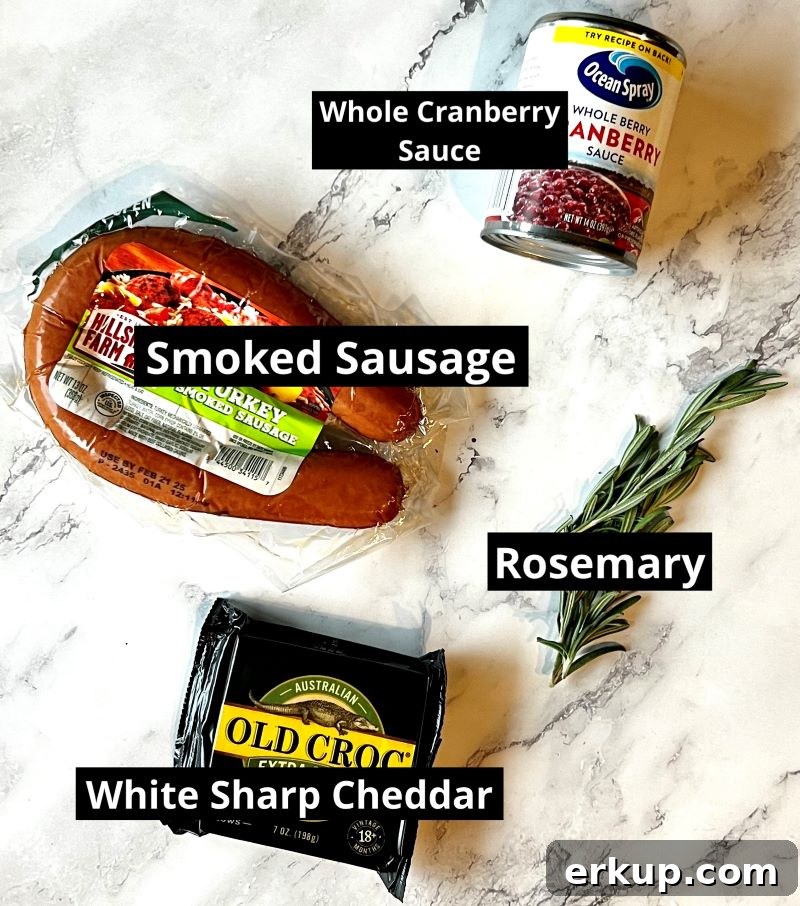 Ingredients- Smoked turkey sausage rope, canned whole cranberry sauce, extra sharp white cheddar cheese, fresh rosemary.