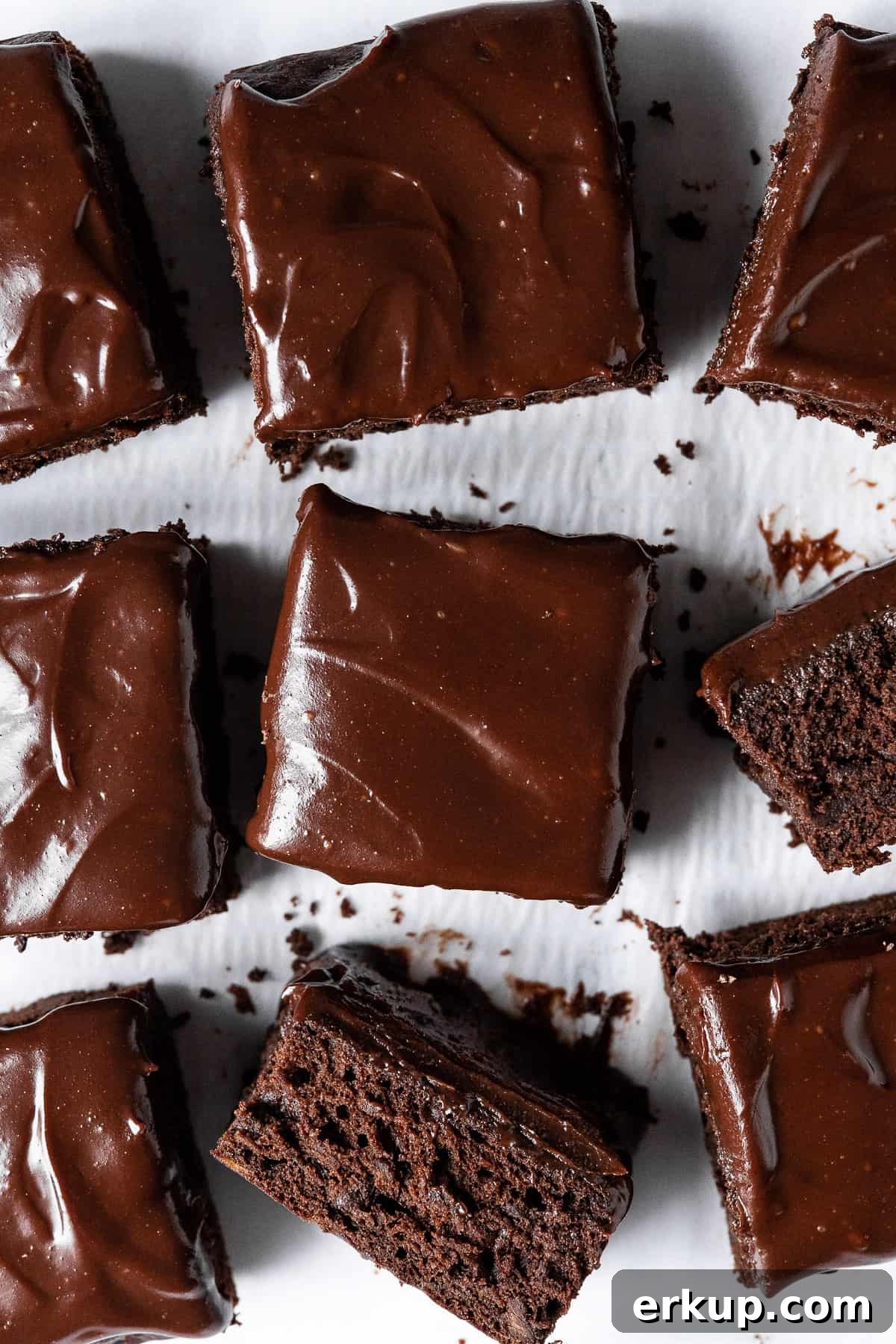 Squares of vegan chocolate banana cake, two turned on their side.