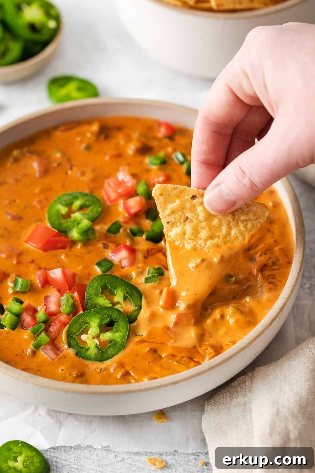 Velveeta chili cheese dip in a bowl.
