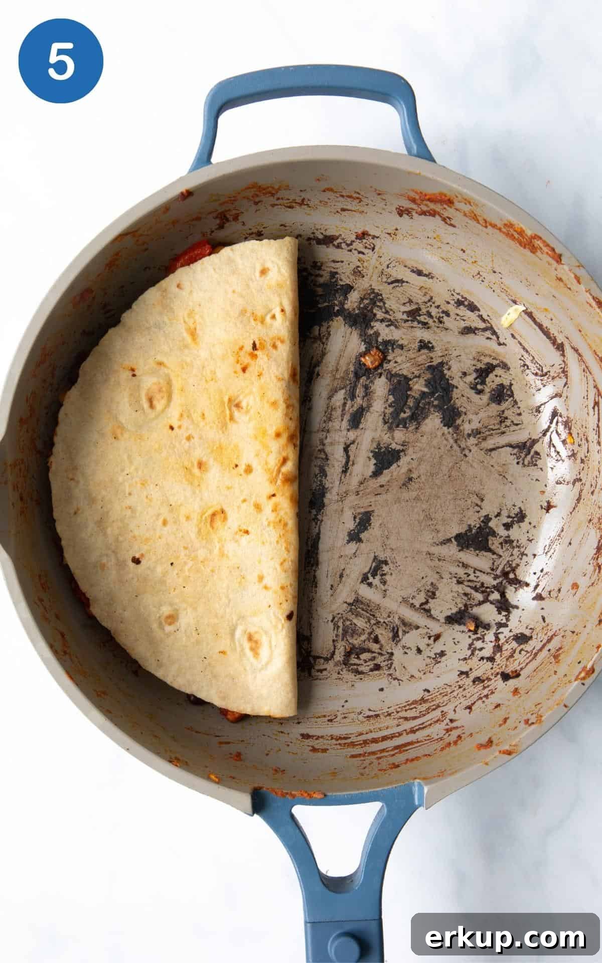 Black Bean Quesadillas Recipe with Creamy Avocado Salsa 8 One-Pan Black Bean Quesadillas in a frying pan.