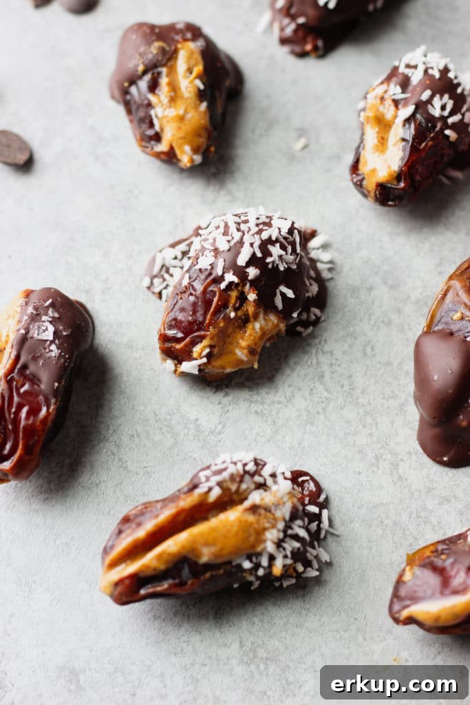 Almond Butter Stuffed Dates Recipe 3 A few dates covered with chocolate and coconut flakes