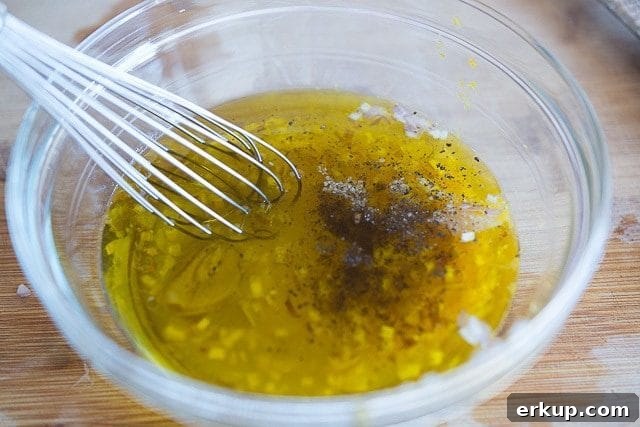 Whisking Olive Oil Vinaigrette in Bowl