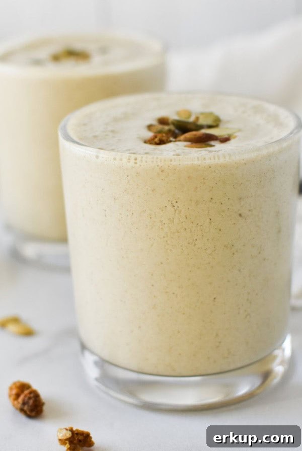 Creamy Sunflower Seed Butter and Maca Smoothie Recipe 7 Two pumpkin seed smoothies topped with toasted pumpkin seeds and mulberries
