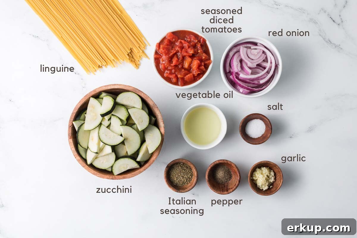 Lemon Garlic Zucchini Linguine with Parmesan 3 Ingredients for zucchini linguine in prep bowls.