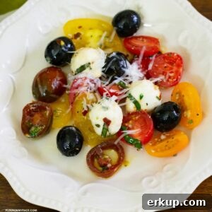 Overhead of a salad plate with a serving of tomato salad.