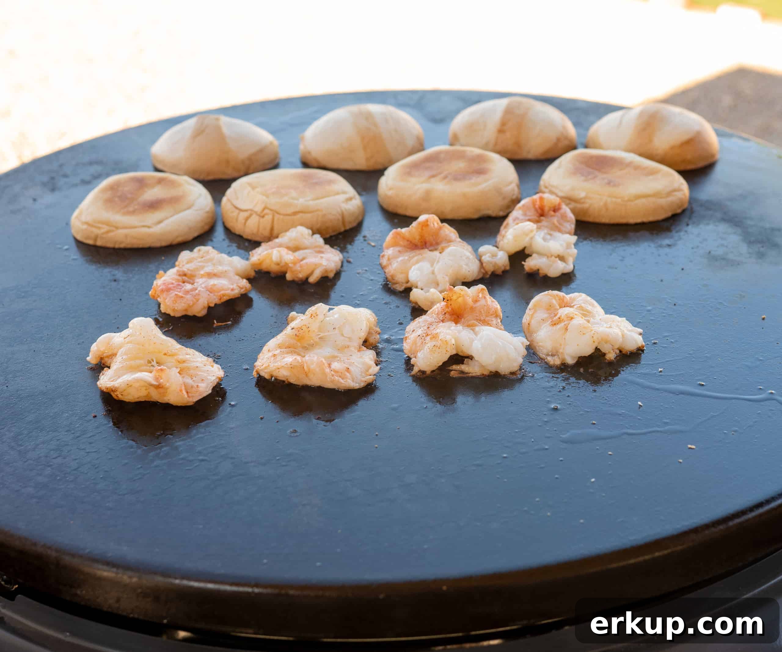 shrimp on griddle vein side down with buns