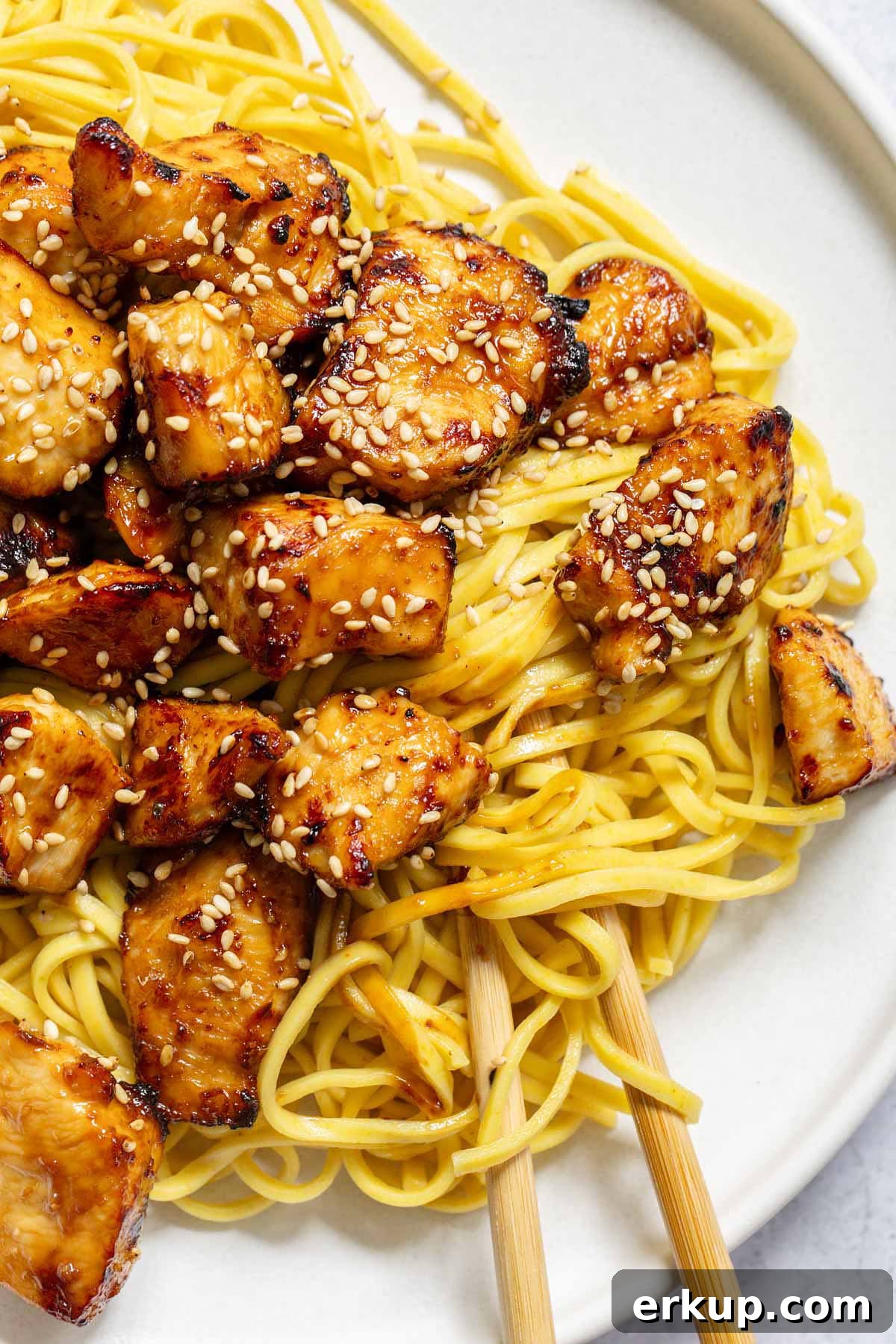 Air fryer hoisin chicken served over noodles