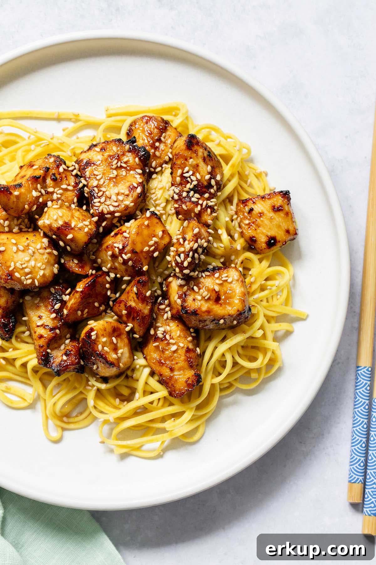 Air fryer hoisin chicken served over noodles