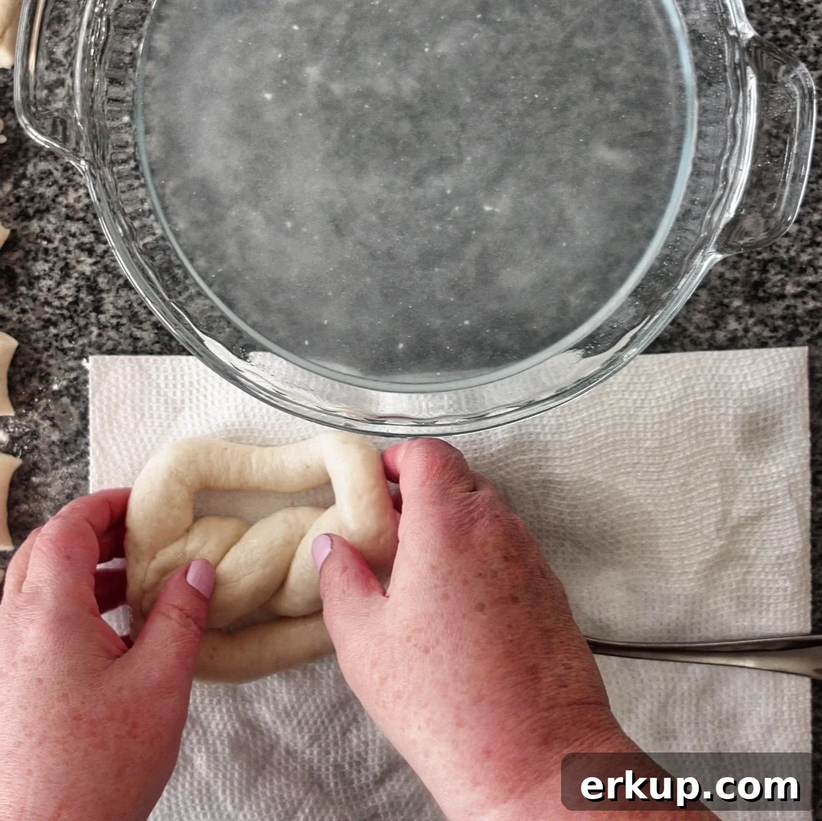 blotting pretzel on paper towel.