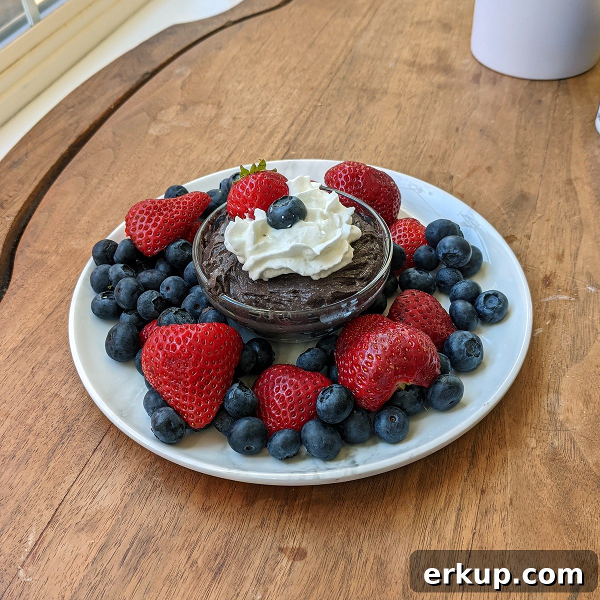 9 Sweet and Savory Low-Calorie Dip Recipes for Snacking 3 Chocolate Fruit Dip on table 1200x1200