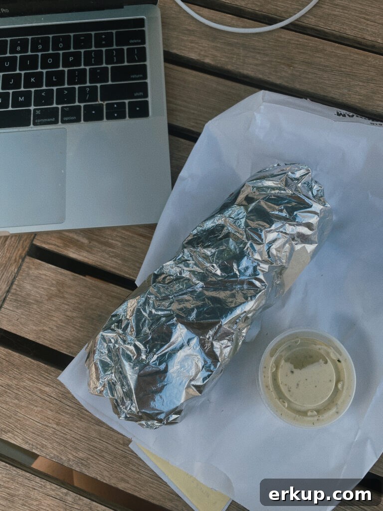 Skier's Breakfast Burrito | Beaumont Bakery 2 breakfast burrito in tinfoil