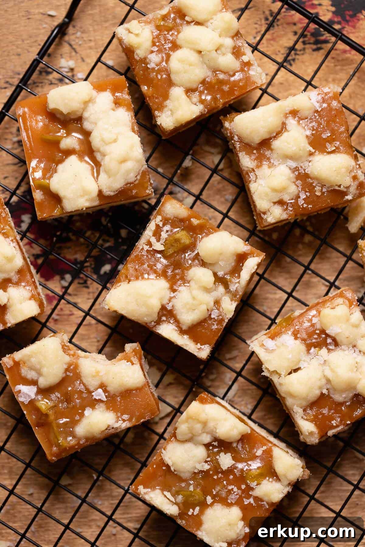 Caramel apple bars on a wire rack.