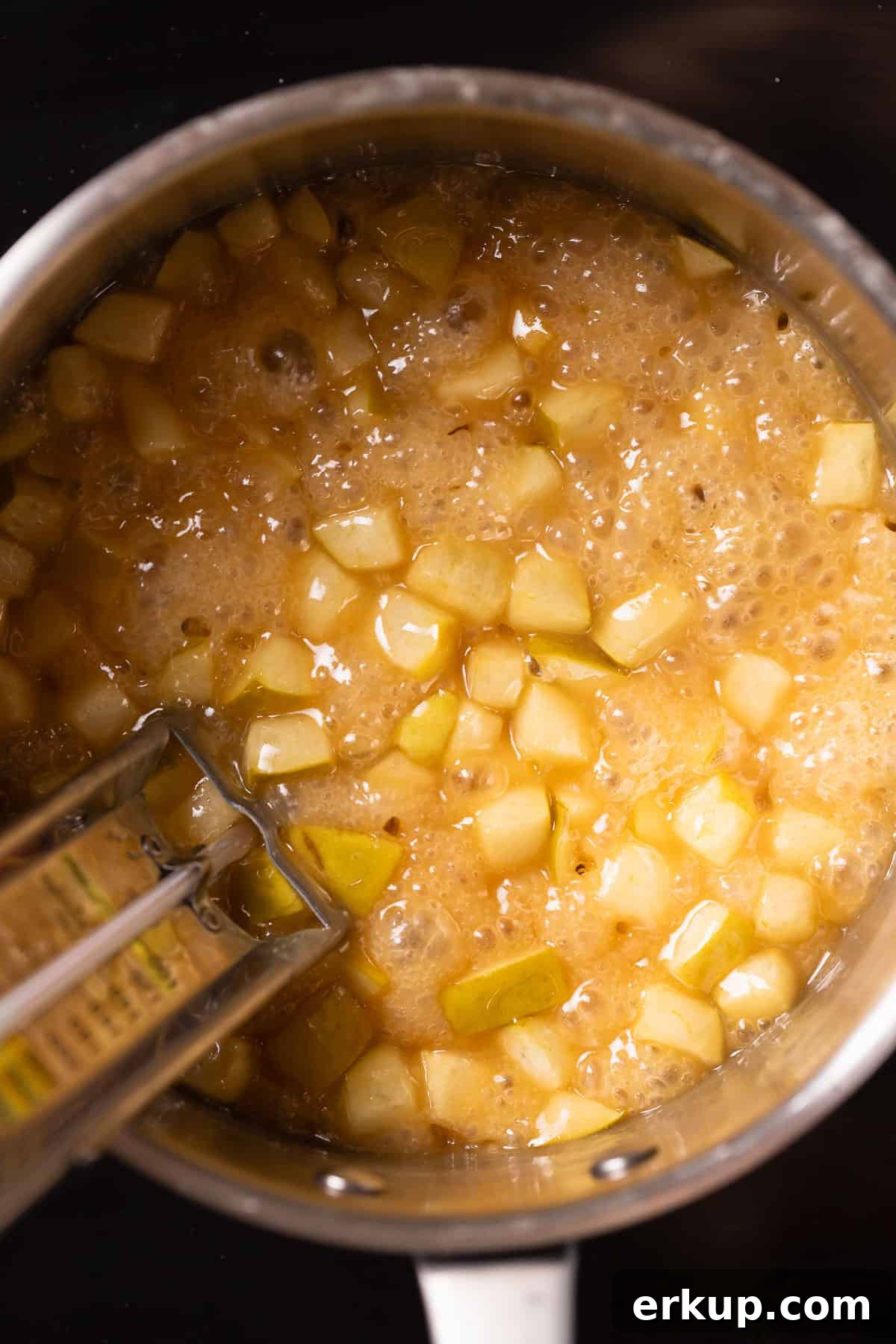 A pot of the apple caramel boiling.