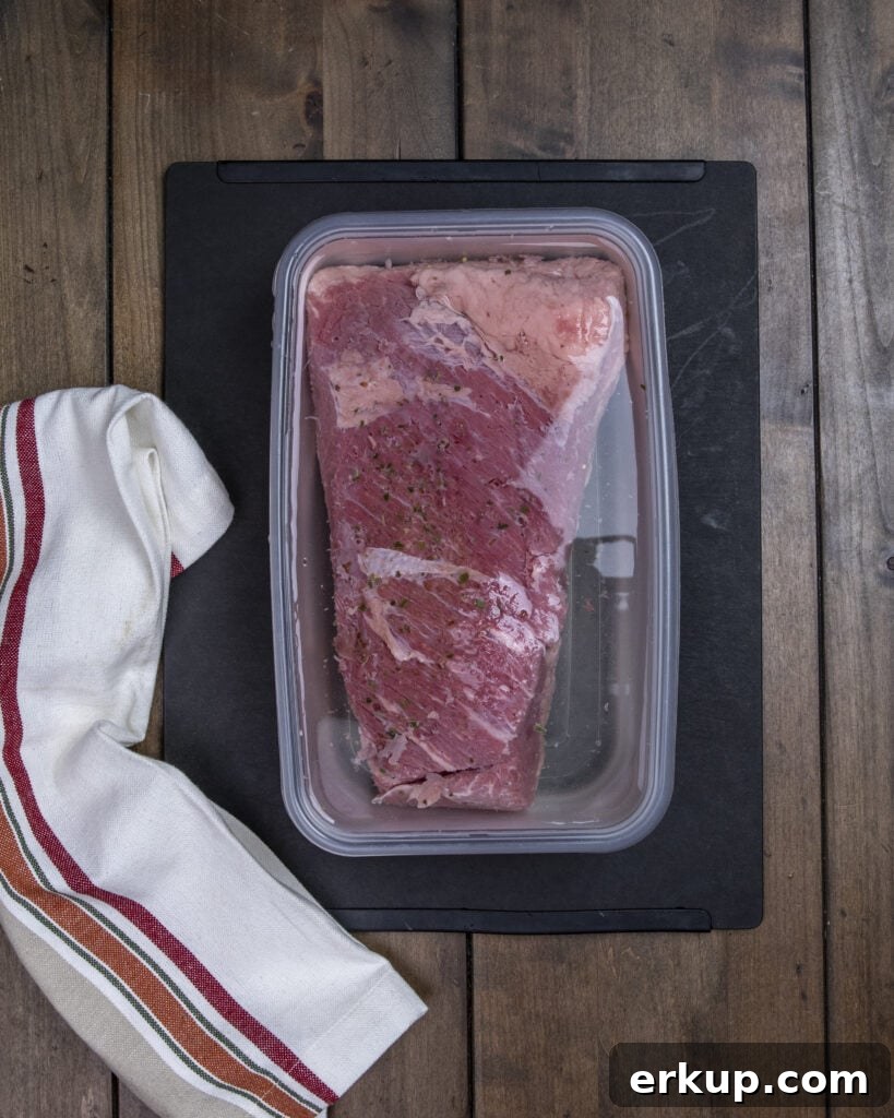 Soaking a corned beef brisket in water 