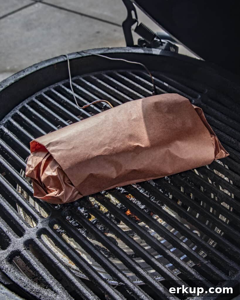Wrapped brisket in butcher paper 