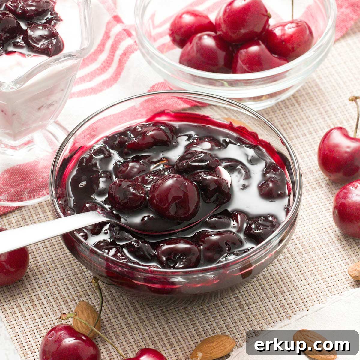 A bowl of cherry compote dessert sauce.