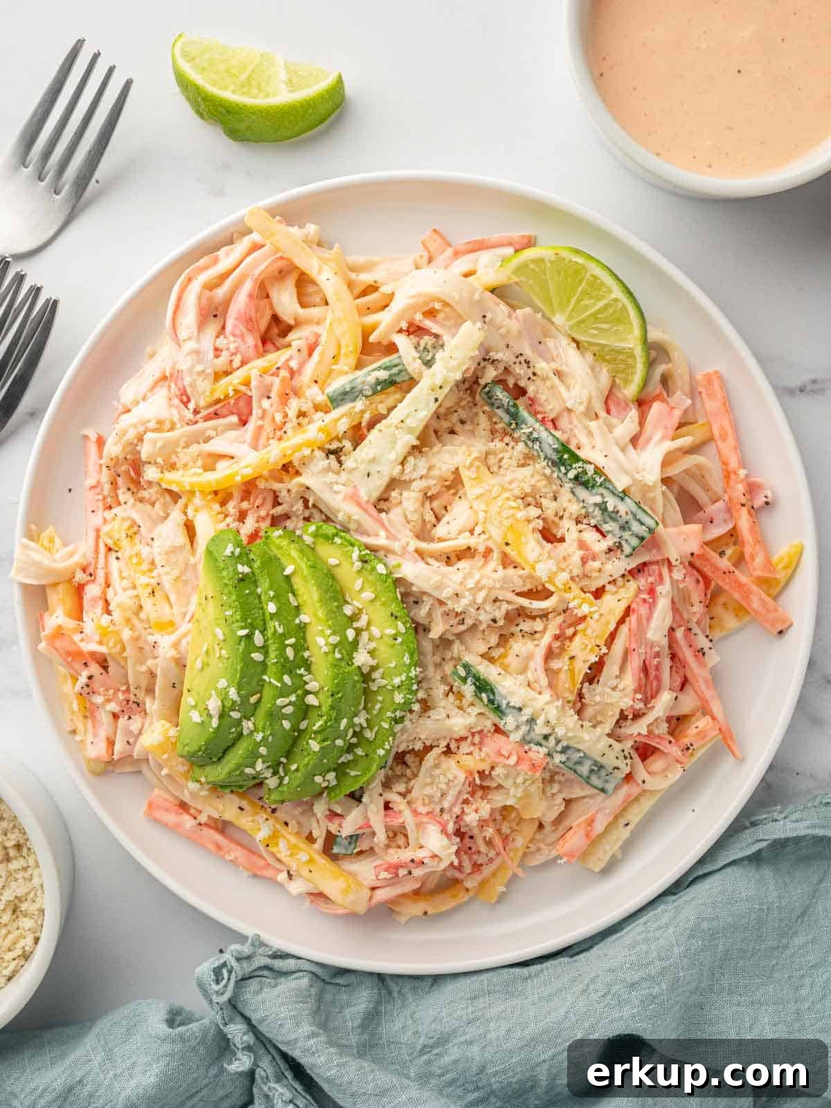 Crab stick salad recipe on a plate.