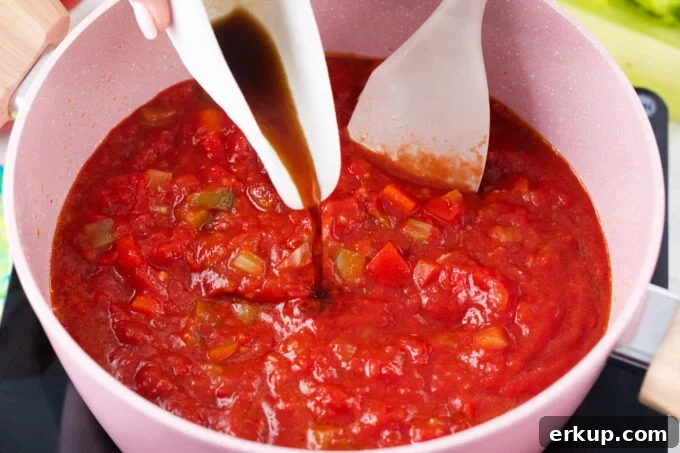 Making the tomato sauce for shrimp creole.