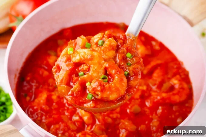 A ladle of Southern shrimp creole.
