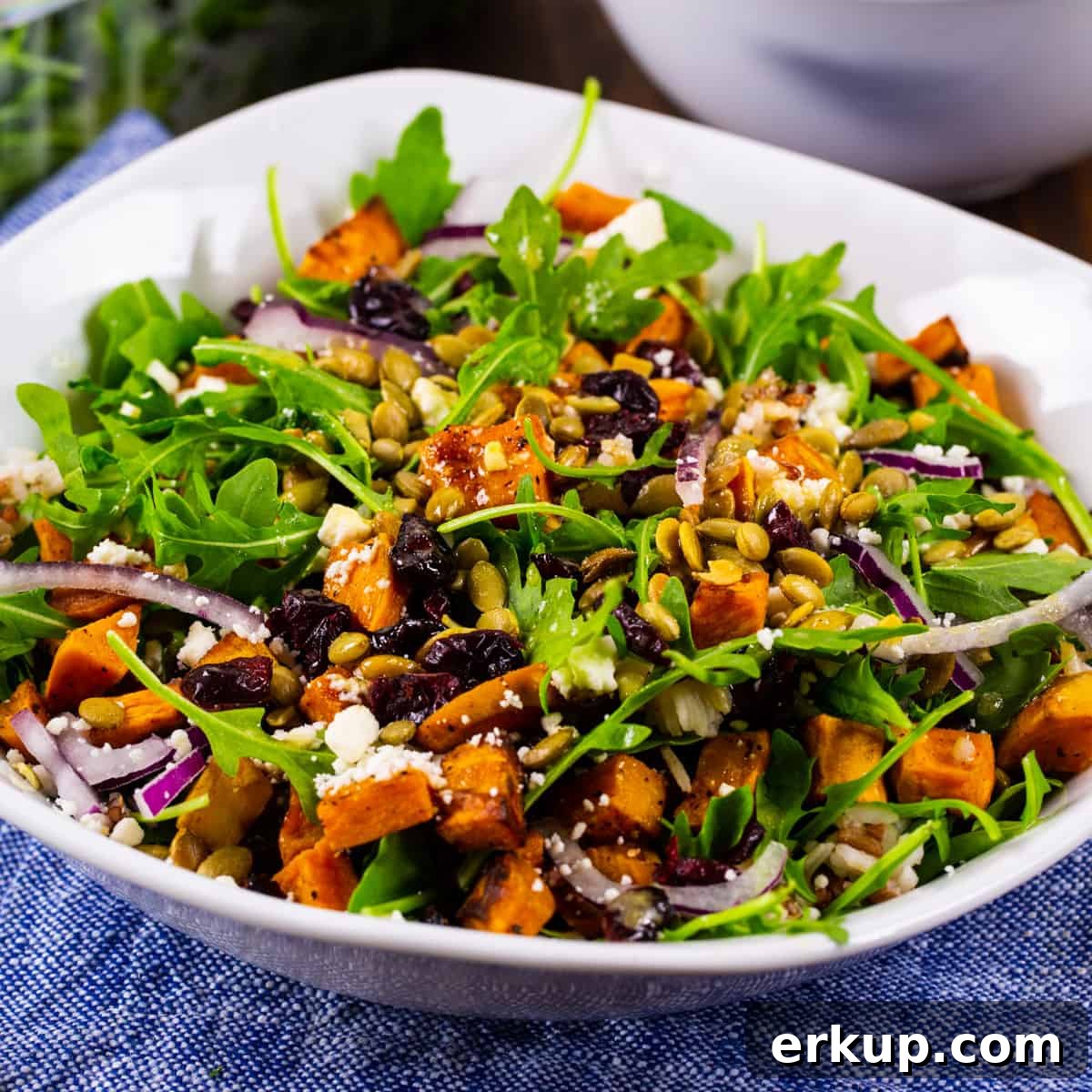 Roasted Sweet Potato, Arugula and Feta Salad Recipe 2 Sweet Potato, Arugula, and Feta Salad in a bowl.
