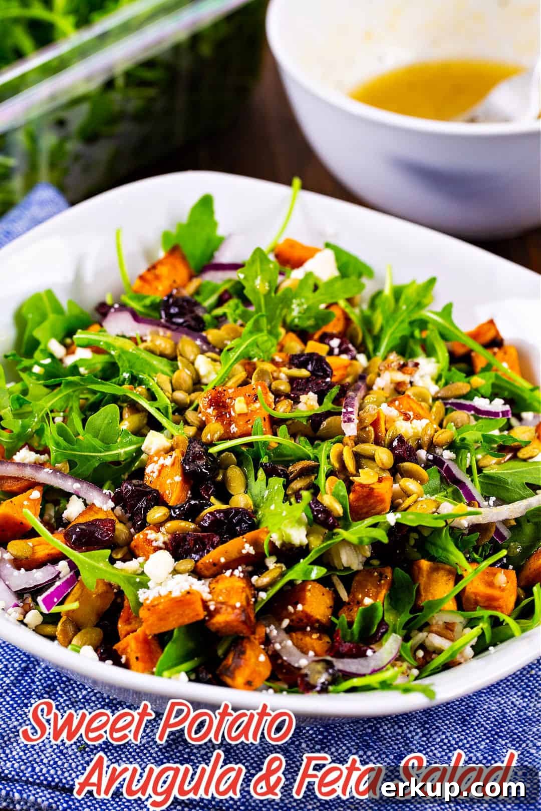 Roasted Sweet Potato, Arugula and Feta Salad Recipe 4 Sweet Potato, Arugula, and Feta Salad in serving bowl.
