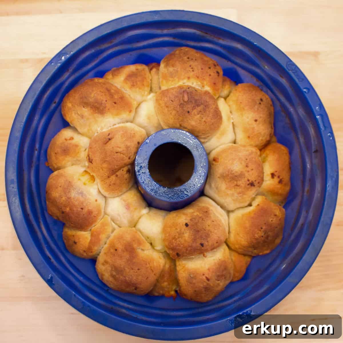 Seafood-Stuffed Monkey Bread: Savory Pull-Apart Bake 8 Monkey bread baked and ready to be removed from the bundt pan.