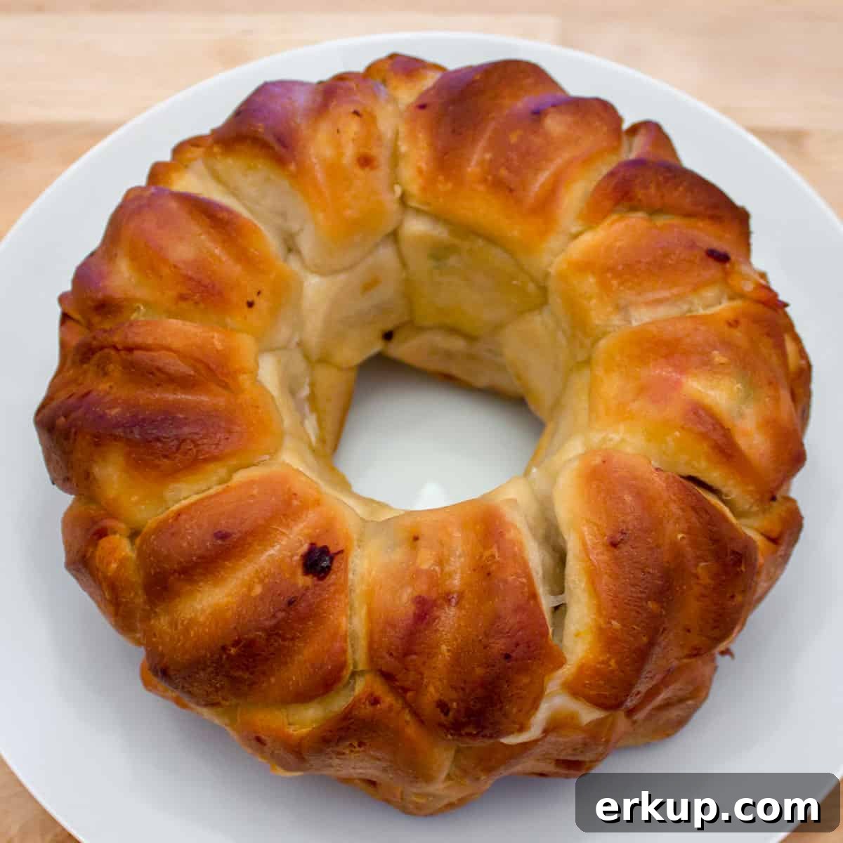 Seafood-Stuffed Monkey Bread: Savory Pull-Apart Bake 9 Baked monkey bread on a plate.