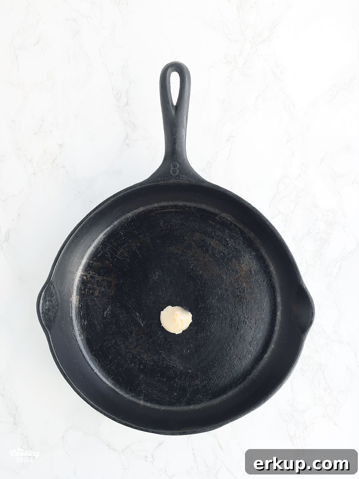 one tablespoon of bacon grease in a cast iron skillet