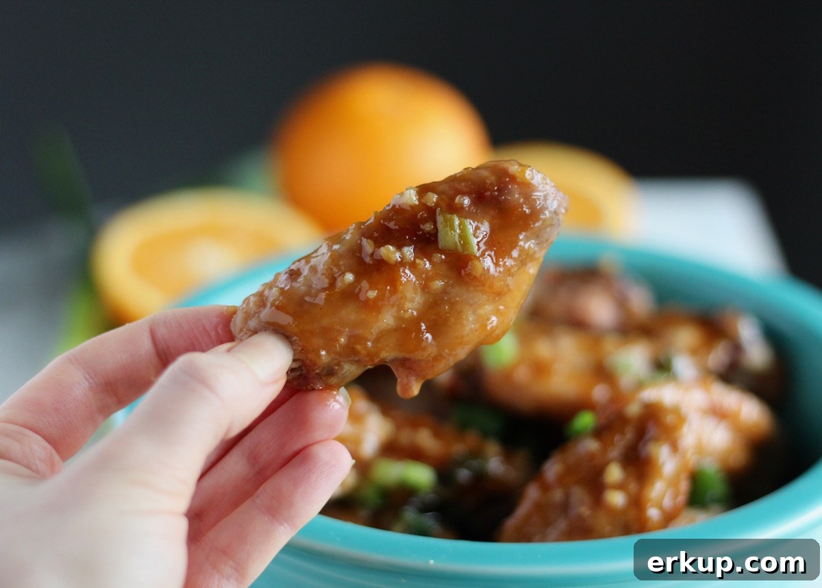 Sweet and Sticky Orange Ginger Wings (AIP) - these easy Paleo wings are super flavorful thanks to the Asian orange ginger garlic sauce! Enjoy as a main course or as an appetizer! | fedandfulfilled.com