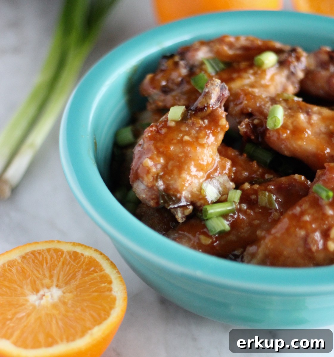 Sweet and Sticky Orange-Ginger Chicken Wings (AIP) 8 Sweet and Sticky Orange Ginger Wings (AIP) - simple Paleo baked chicken wings are taken to the next level with a flavorful sweet and spicy orange ginger garlic sauce! YUM! | fedandfulfilled.com