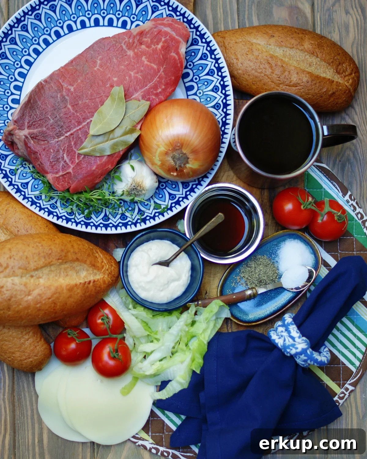 Ingredients for a Roast Beef Po Boy include Chuck Roast, beef broth, thyme, bay leaves, salt, pepper and garlic cloves.