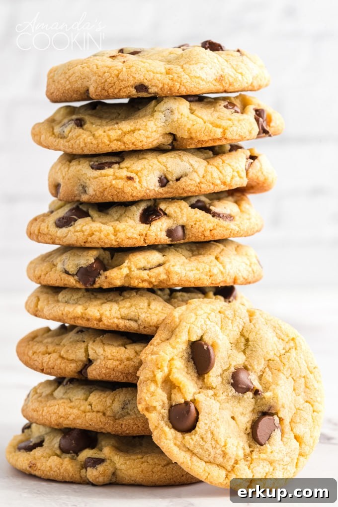 These Chocolate Chip Pudding Cookies are soft and chewy and always a hit. Easy to make with instant pudding, you can even freeze to make a few at a time! tall stack of Chocolate Chip Pudding Cookies