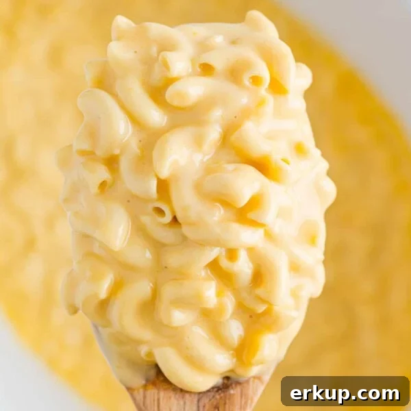 Large scoop of crockpot mac and cheese.