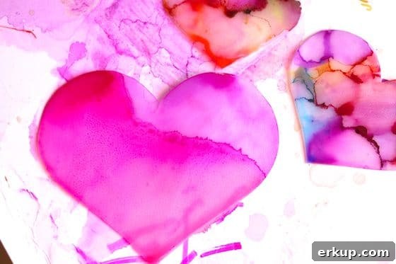 15 Valentine's Day Crafts for Kids Ages 5 to 10 6 hearts coloured with sharpies and dripped with rubbing alcohol