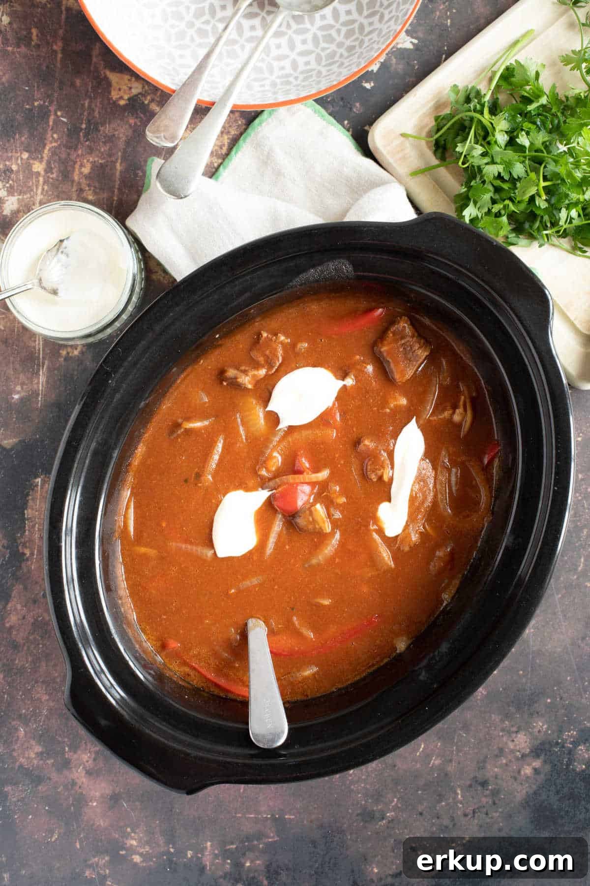 Slow Cooker Hungarian Beef Goulash with Paprika 2 Beef goulash in a slow cooker.