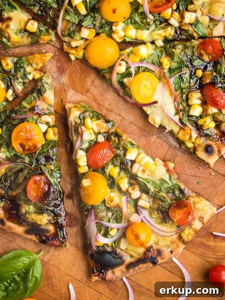 Flatbread Pizza with pesto and vegetables.
