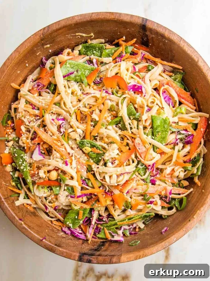 Rice noodles with vegetables and tahini dressing.